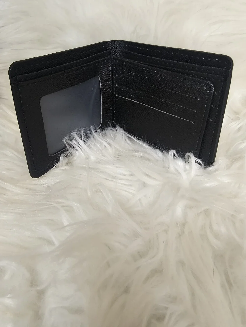 Black Embossed Leather Bifold Wallet